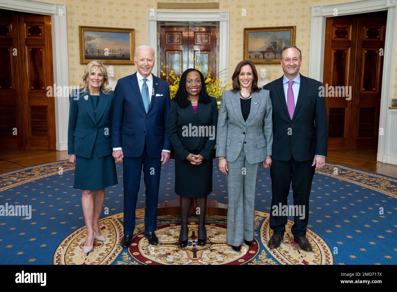 Reportage: President Joe Biden, First Lady Jill Biden, Vice President Kamala Harris and Second Gentleman Doug Emhoff pose for a photo with Judge Ketanji Brown Jackson in the Blue Room of the White House, Friday, February 25, 2022, after the announcement of her nomination to the U.S. Supreme Court. Stock Photo