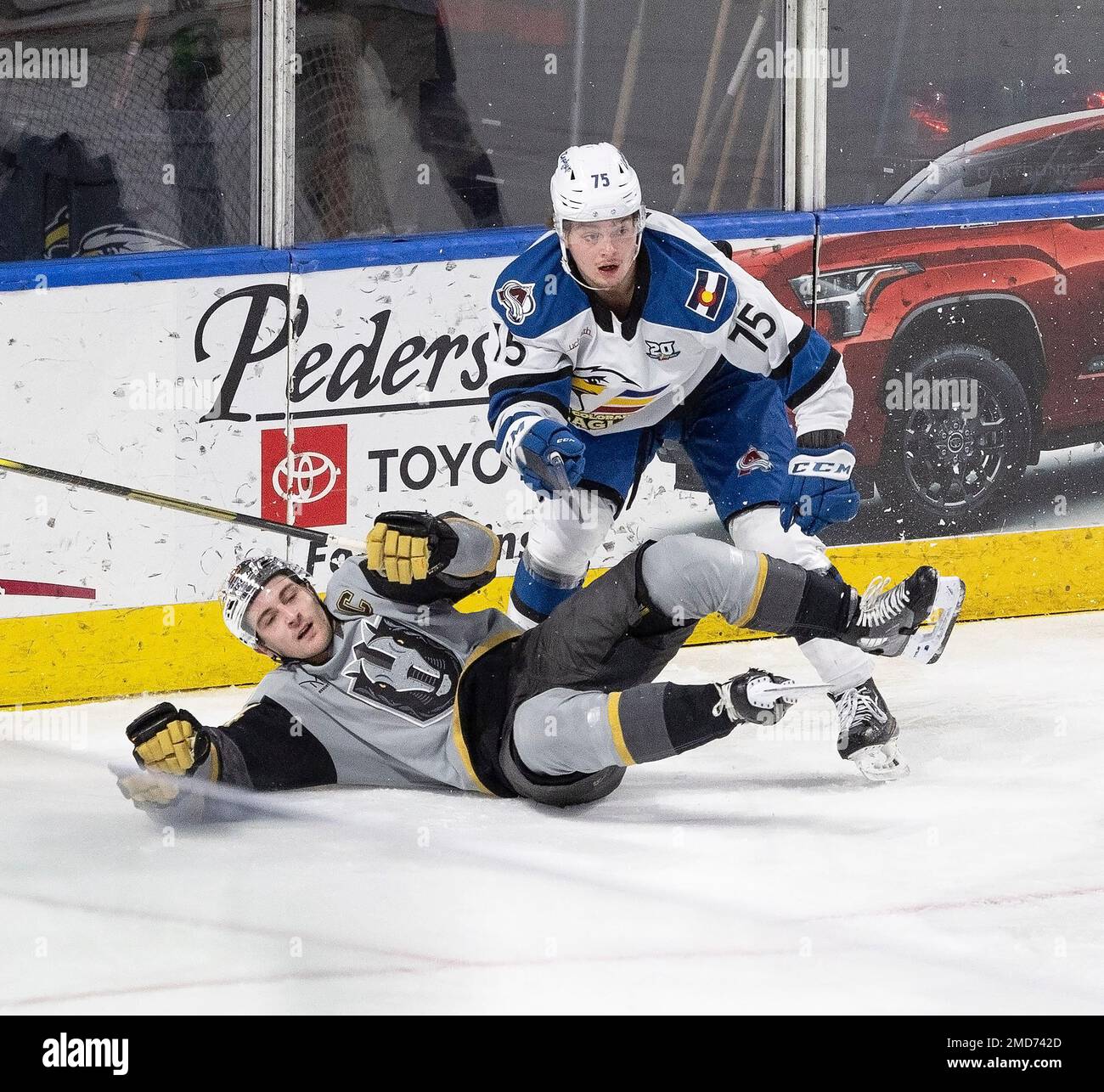 Loveland, Colorado, USA. 21st Jan, 2023. Eagles LW SAMPO RANTA takes down a Silver Knight behind the net Saturday night at the Budweiser Events Center. The Eagles beat the Silver Knights 5-4. (Credit Image: © Hector Acevedo/ZUMA Press Wire) EDITORIAL USAGE ONLY! Not for Commercial USAGE! Stock Photo