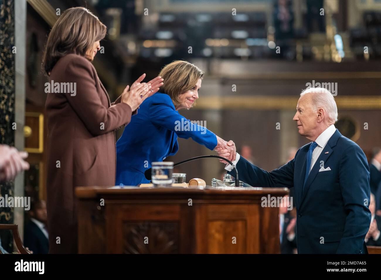 Reportage: President Joe Biden shakes hands with House Speaker Nancy Pelosi after delivering his State of the Union address to a joint session of Congress, Tuesday, March 1, 2022, in the House Chamber at the U.S. Capitol Stock Photo