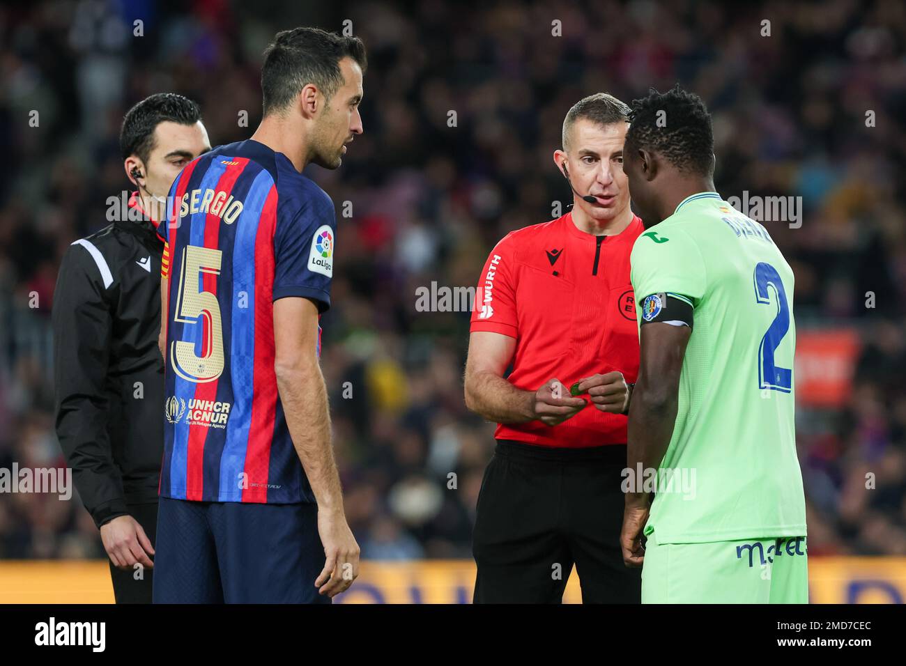 Sergio Busquets of FC Barcelona and Djene of Getafe CF during the Liga match between FC Barcelona and Getafe CF at Spotify Camp Nou in Barcelona, Spain. Stock Photo