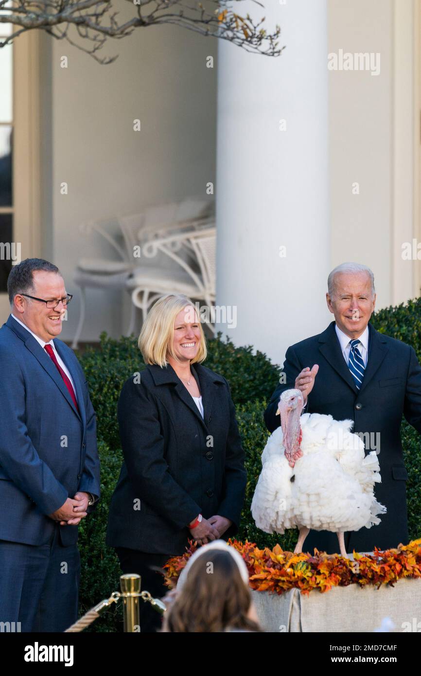 Reportage: President Joe Biden, joined by Phil Seger, chairman of the National Turkey Federation and Andrea Welp, a turkey grower from Indiana, pardons turkeys Peanut Butter and Jelly during the National Turkey Presentation, Friday, November 19, 2021, in the Rose Garden of the White House Stock Photo