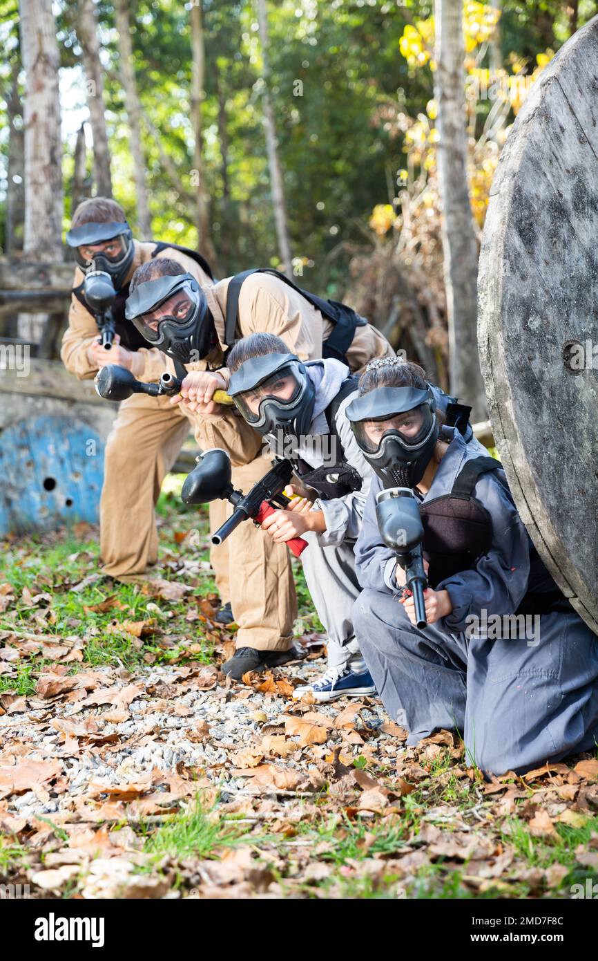 Paintball players aiming outdoors Stock Photo Alamy