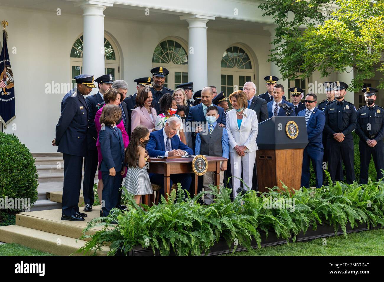 Reportage: President Joe Biden, joined by Vice President Kamala Harris, members of congress and U.S. Capitol police officers, signs H.R. 3325, a bill awarding four Congressional Gold Medals to the U.S. Capitol Police and those who protected the U.S. Capitol on January 6, 2021, Thursday, August 5, 2021, in the Rose Garden Stock Photo