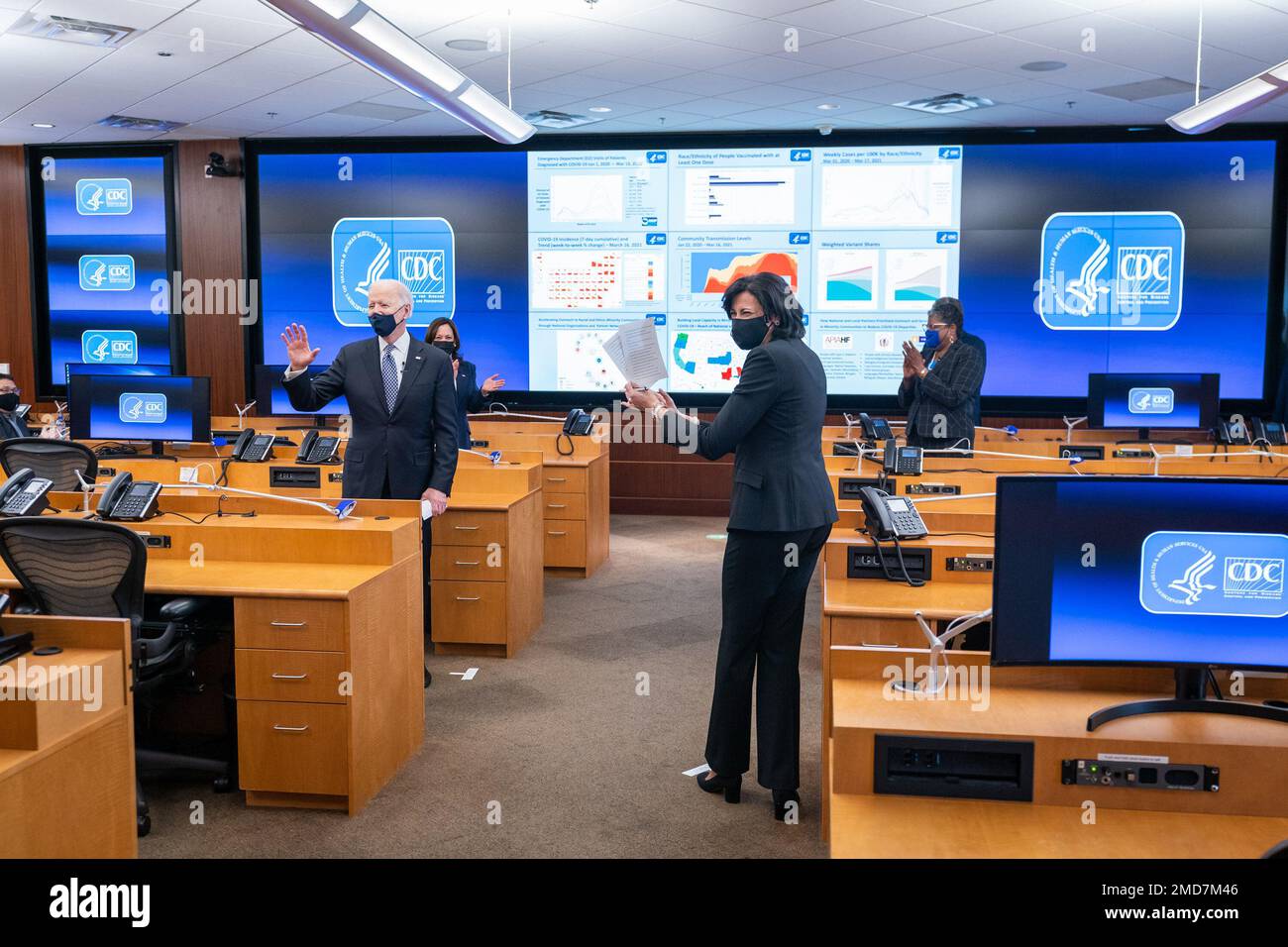 Reportage: President Joe Biden, joined by Vice President Kamala Harris and Director of the Centers for Disease Control (CDC) Dr. Rochelle Walensky, talks with CDC staff during a briefing Friday, March 19, 2021, at the CDC headquarters in Atlanta. Stock Photo