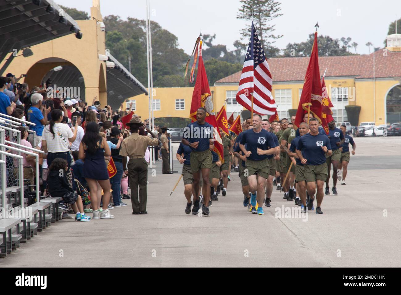 U.S. Marines with Marine Corps Recruit Depot (MCRD) San Diego, lead the new Marines of India Company, 3rd Recruit Training Battalion on a motivational run at MCRD San Diego, July 14, 2022. The Marines leading from the front were responsible for the training and organization of 3rd Recruit Training Battalion. Stock Photo