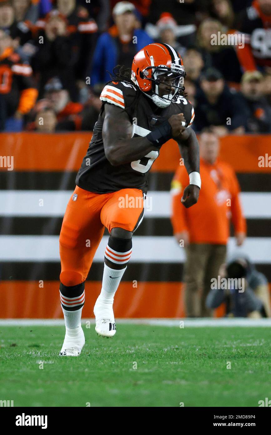 Cleveland Browns defensive end Takkarist McKinley (55) runs after the ball  during an NFL football game against the Baltimore Ravens, Sunday, Dec. 12,  2021, in Cleveland. (AP Photo/Kirk Irwin Stock Photo - Alamy