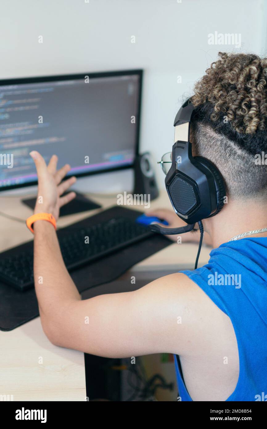 Busy Man Working On Computer At Workplace Stock Photo