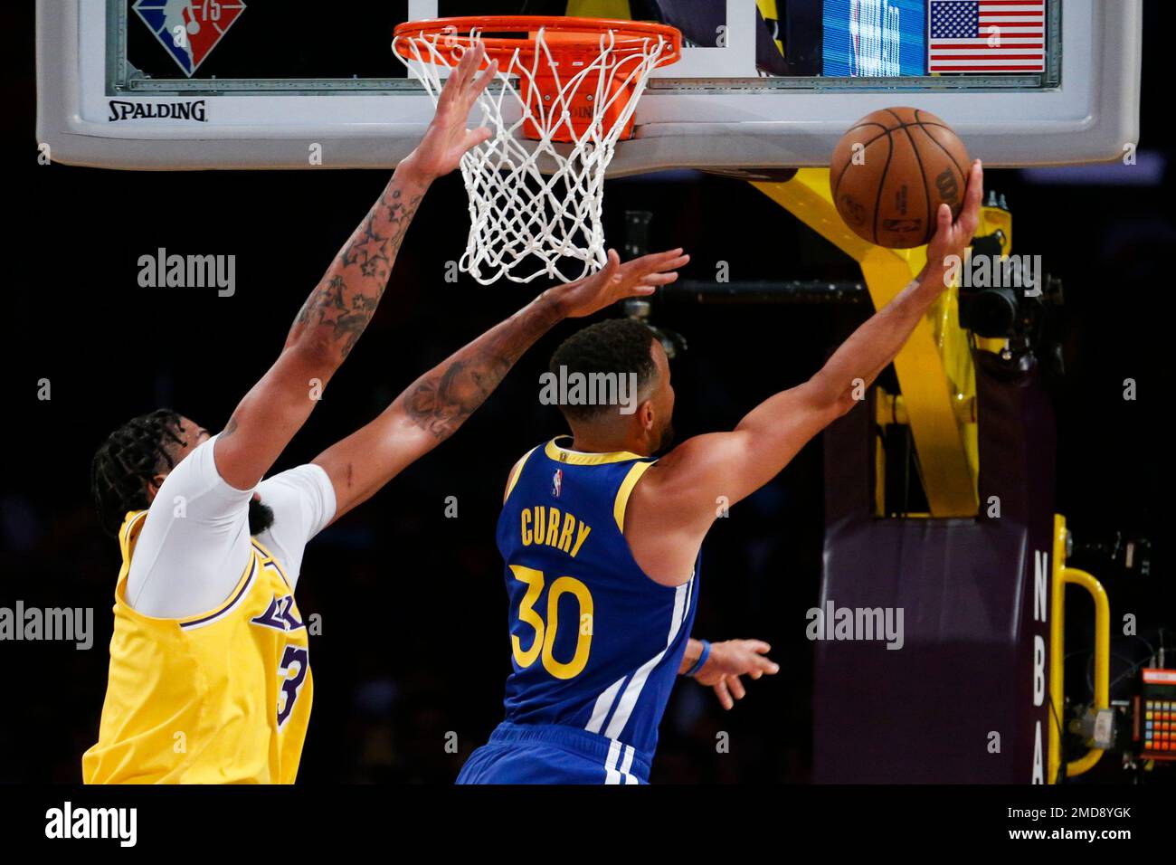 Golden State Warriors guard Stephen Curry (30) goes up to basket under