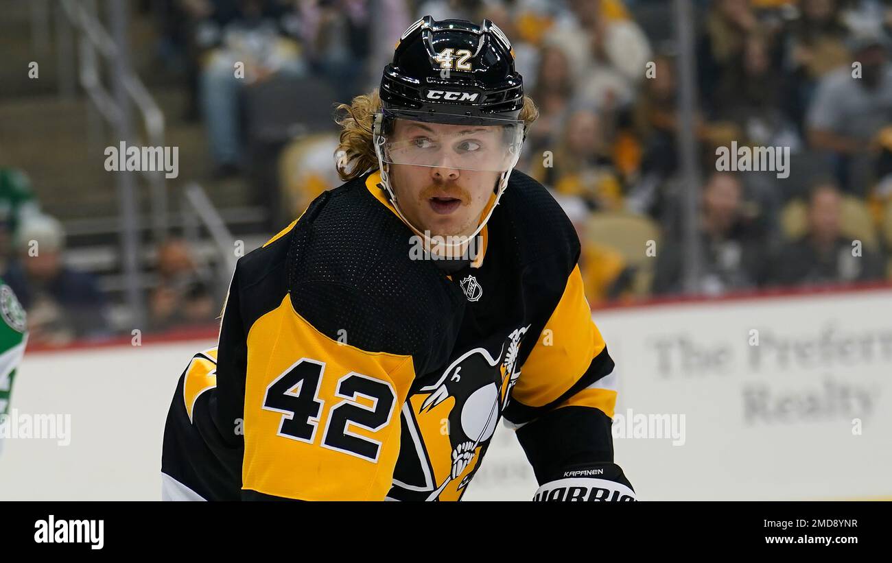 Pittsburgh Penguins' Kasperi Kapanen (42) celebrates his third goal of the  team's NHL hockey game against the Minnesota Wild, during the third period  in Pittsburgh, Saturday, Nov. 6, 2021. The Wild won