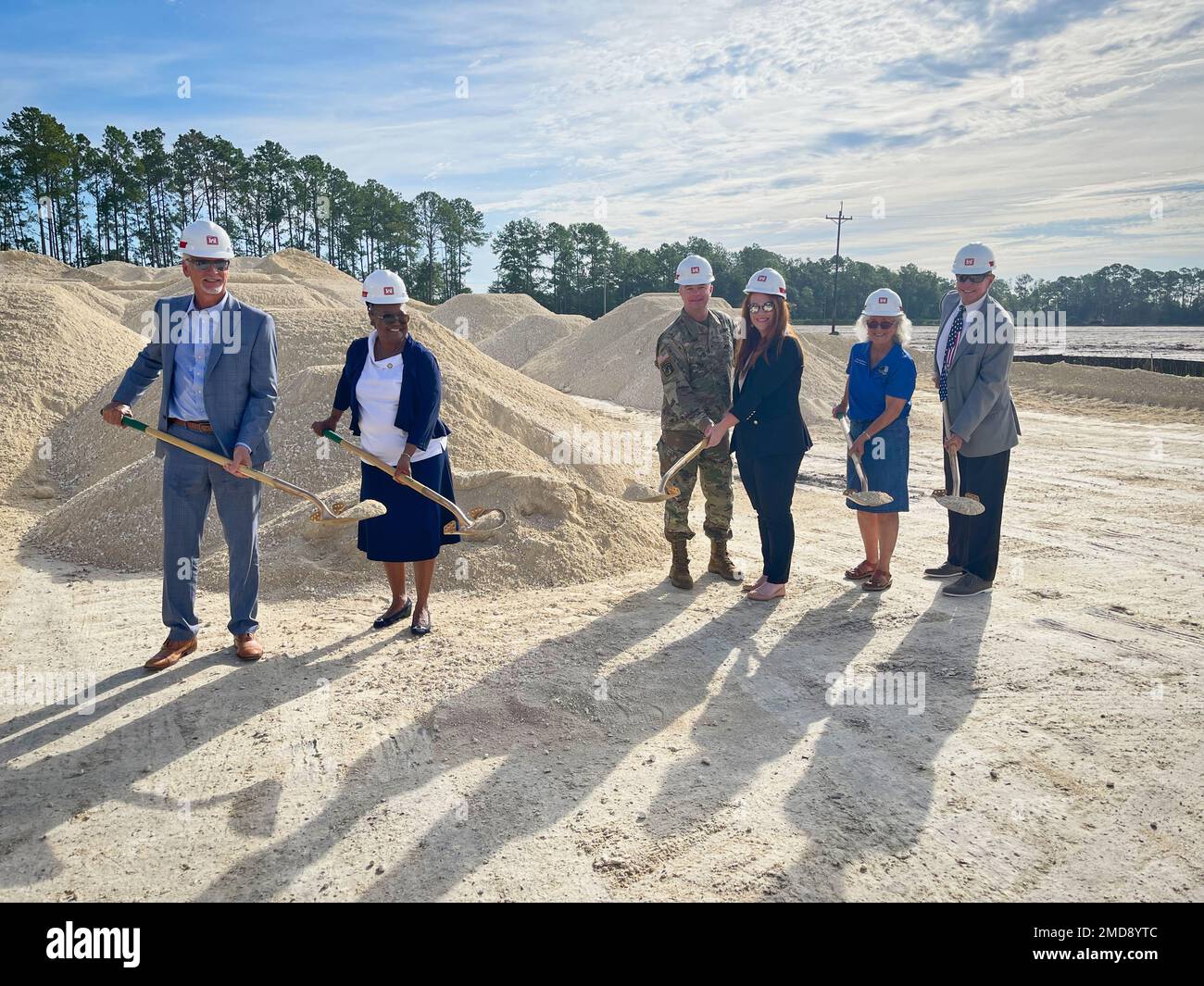 Distinguished guests complete the ceremonial 'first dig' during the Equipment Concentration Site groundbreaking ceremony here.    The groundbreaking ceremony today marked the preperation of building a new storage site for Army Reserve equipment. The completion of this ceremony means construction can now begin on the first United States Army Reserve equipment concentration site in the state of Florida. The facility will be located within the city of Gainesville.    This 45,694 sq. ft. facility will help eliminate the need for some Army Reserve units to travel more than 600 miles to neighboring Stock Photo