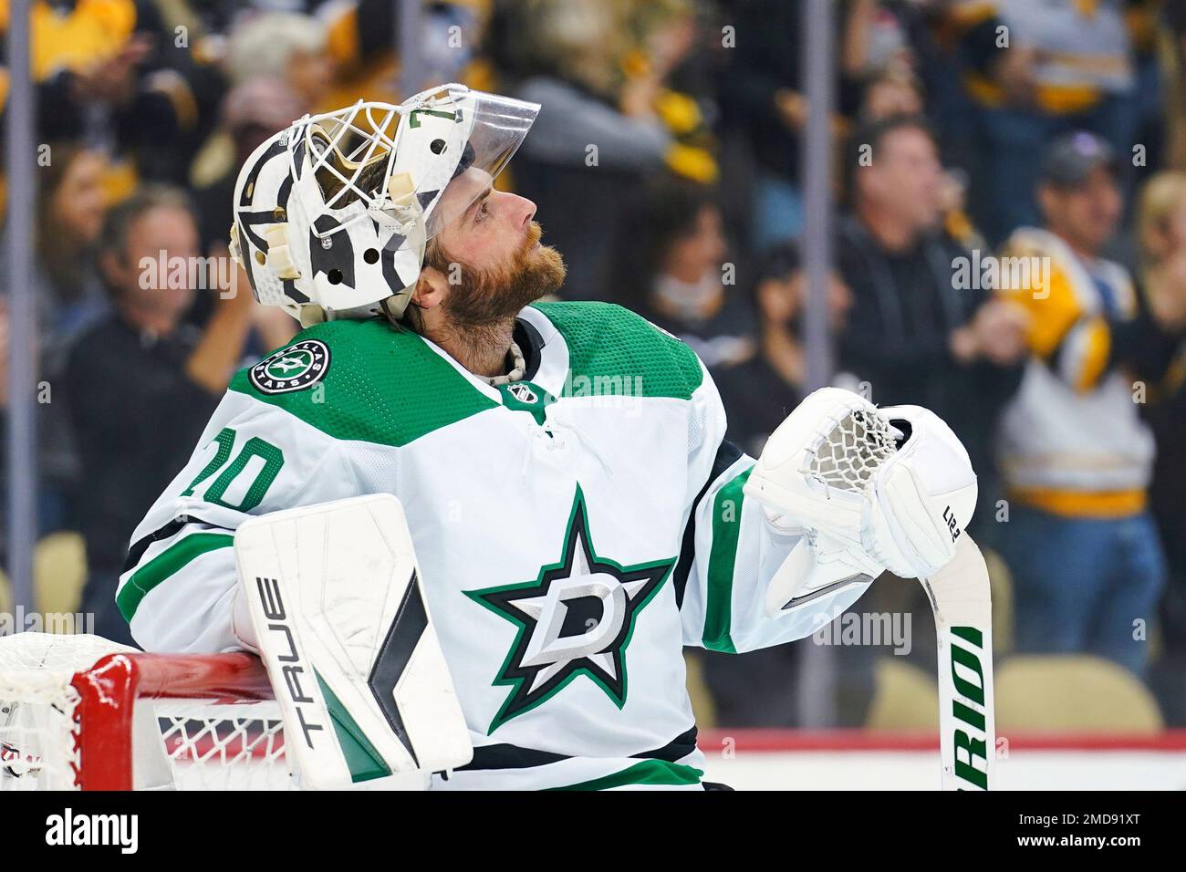 Dallas Stars goaltender Braden Holtby (70) looks on against the New Jersey  Devils during the second period of an NHL hockey game Tuesday, Jan. 25,  2022, in Newark, N.J. (AP Photo/Adam Hunger