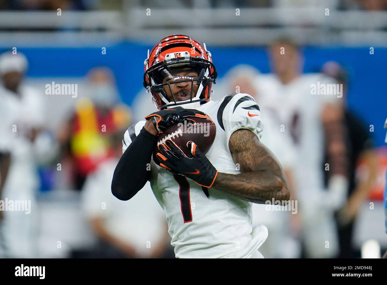 Cincinnati Bengals wide receiver Ja'Marr Chase (1) catches a pass against  the Detroit Lions during an NFL football game in Detroit, Sunday, Oct. 17,  2021. (AP Photo/Paul Sancya Stock Photo - Alamy