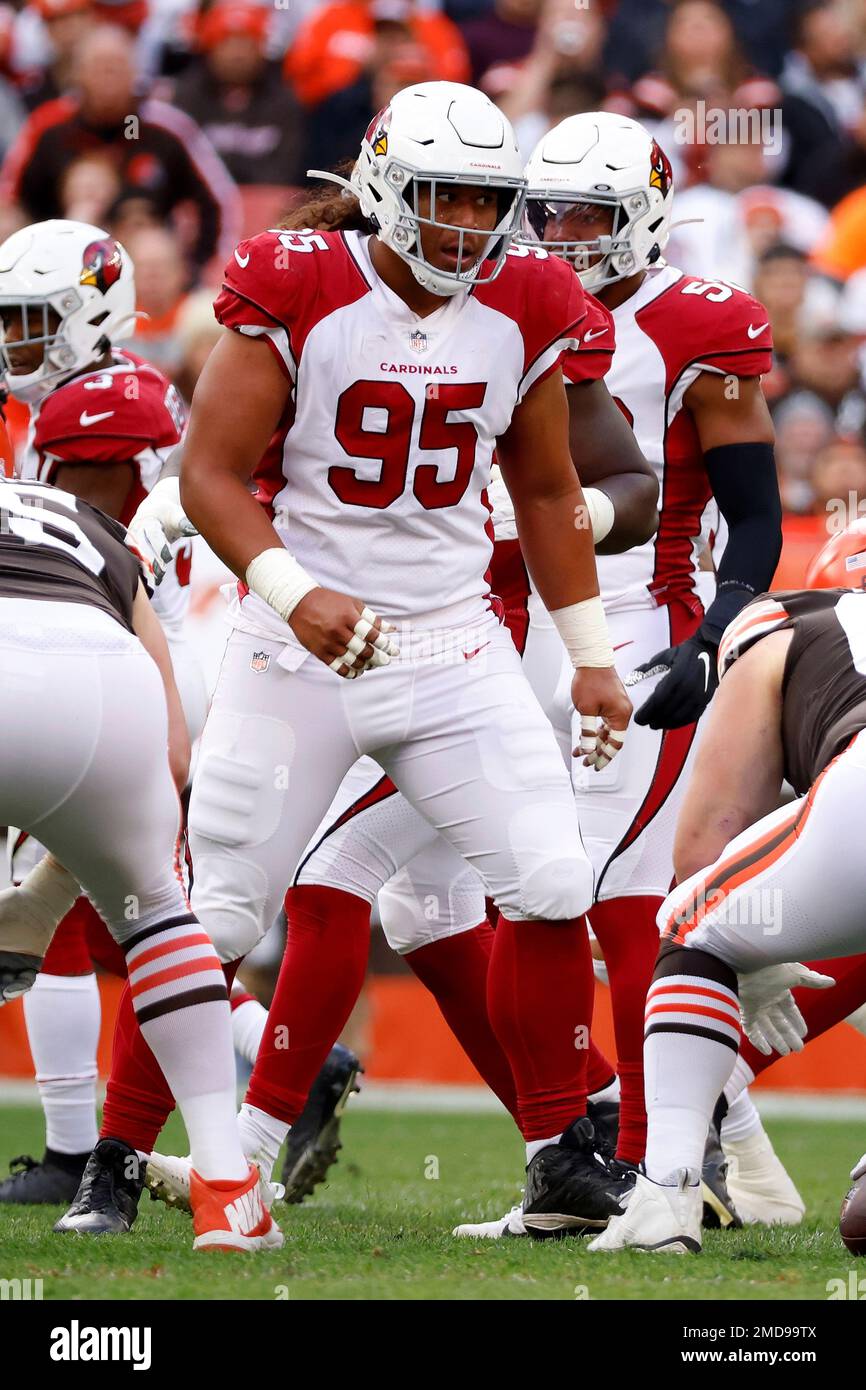 Arizona Cardinals defensive tackle Leki Fotu (95) warms up before