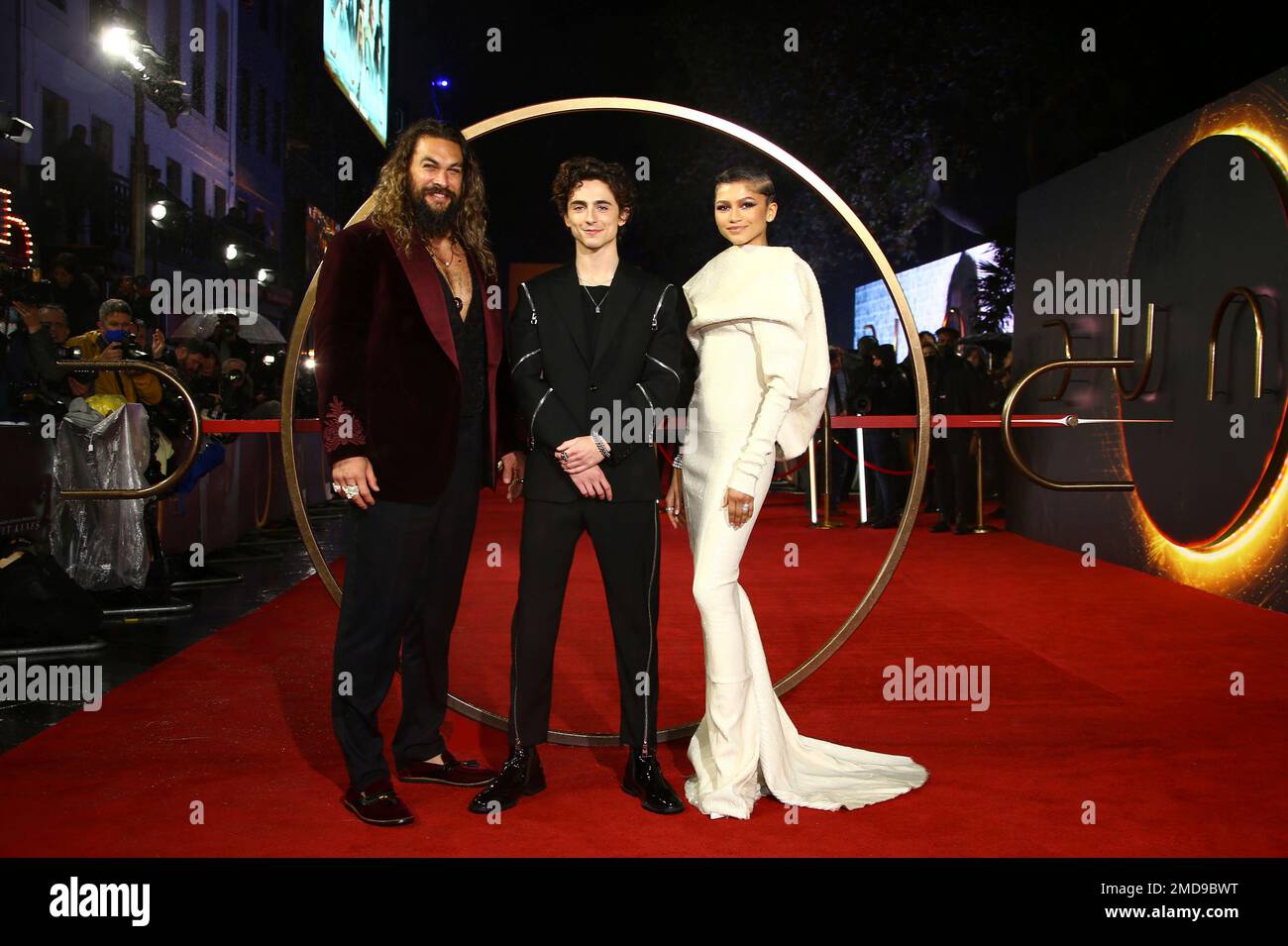 Jason Momoa, from left, Timothee Chalamet, and Zendaya pose for