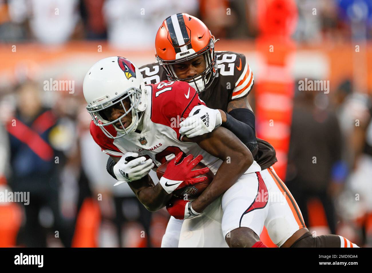 Arizona Cardinals wide receiver A.J. Green (18) is tackled by Cleveland  Browns cornerback Greedy Williams (26) after a pass reception during the  second half of an NFL football game, Sunday, Oct. 17,