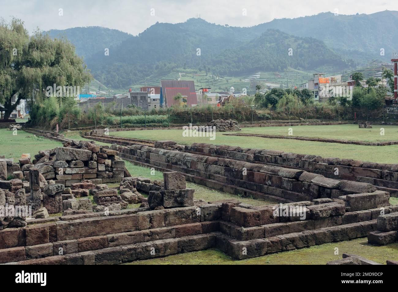 The ruins of Candi Arjuna Hindu temple stones in Dieng Plateau, Banjarnegara, Indonesia Stock Photo