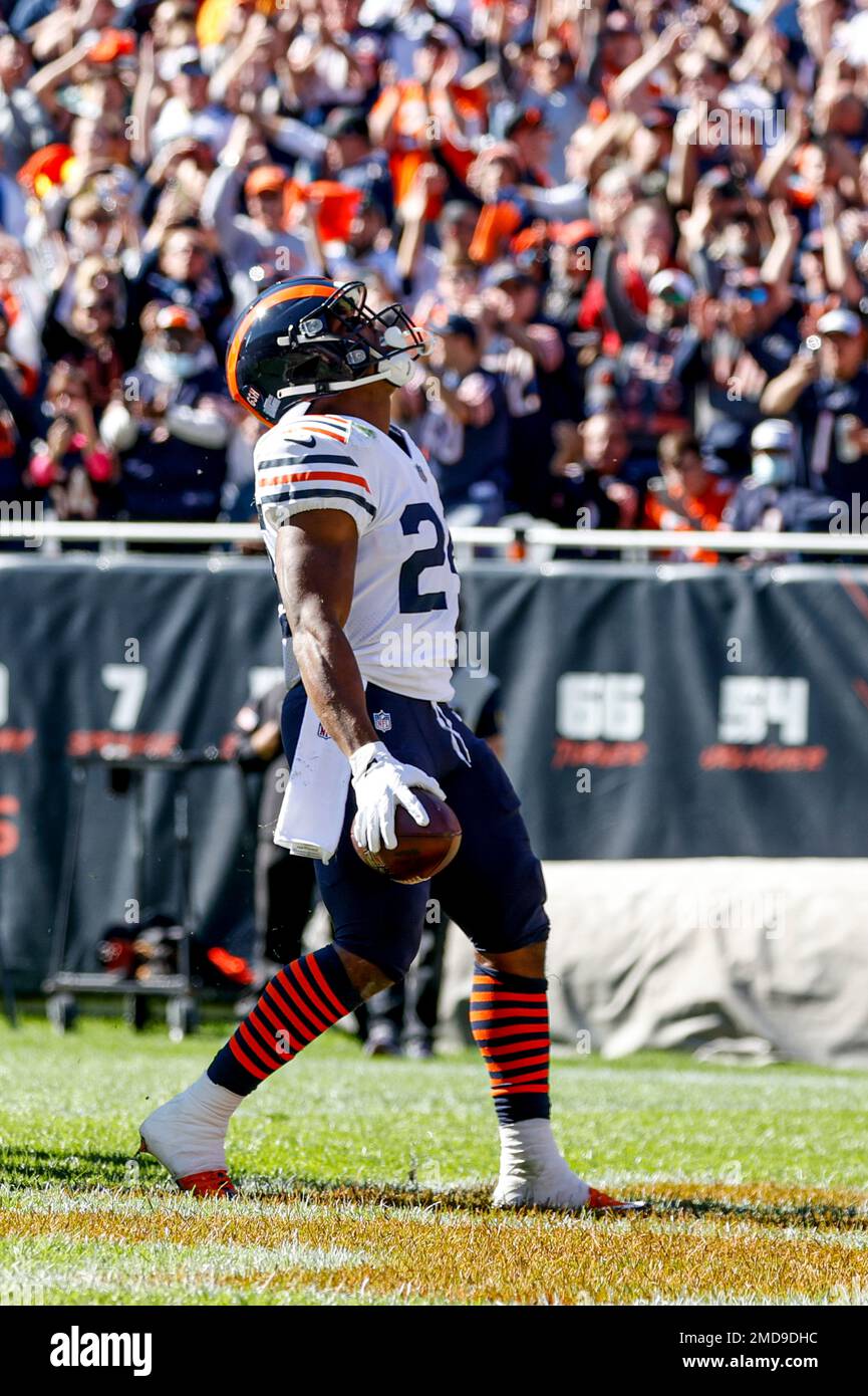 Chicago Bears running back Khalil Herbert (24) reacts after a