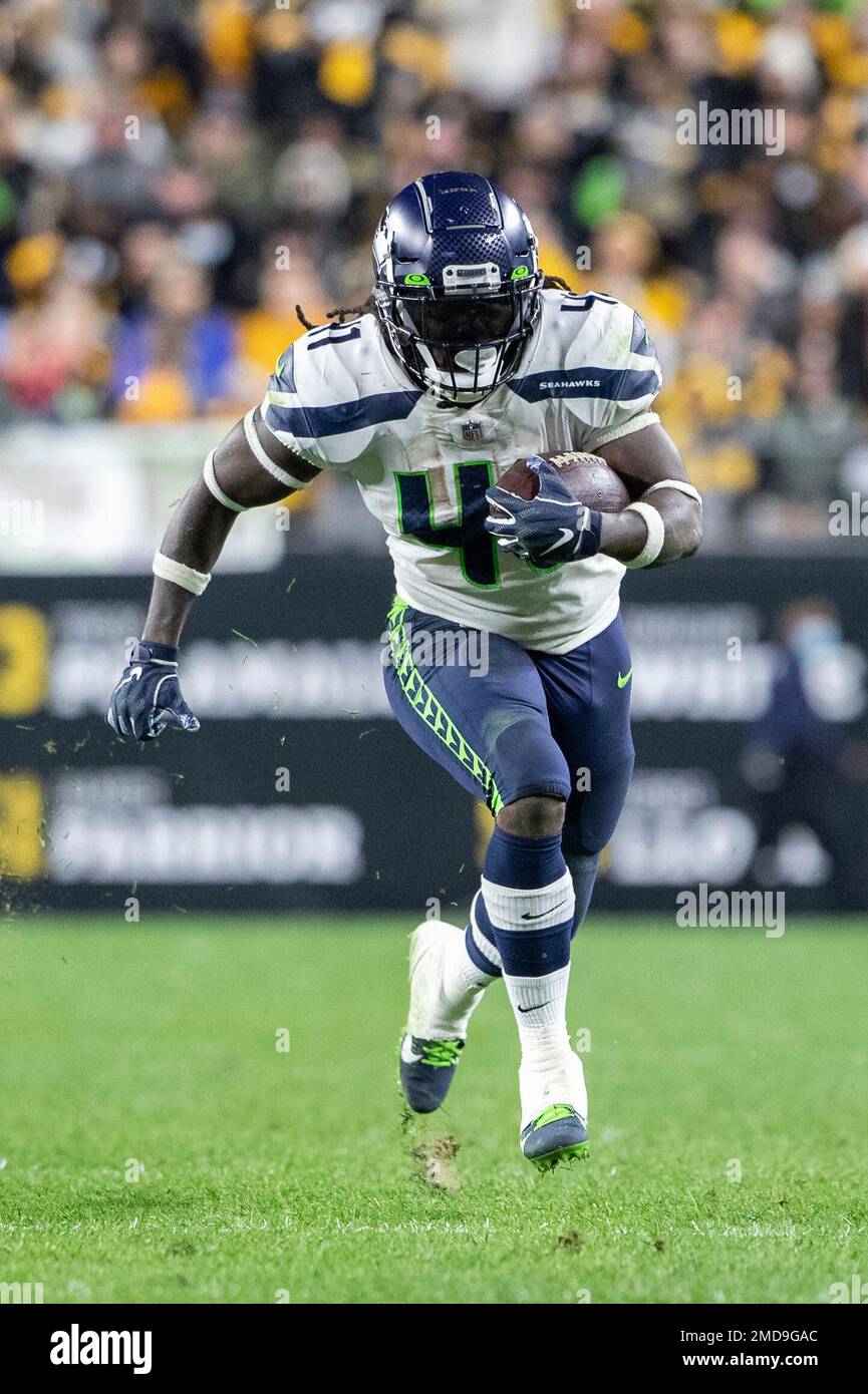 Seattle Seahawks running back Alex Collins (41) rushes during an