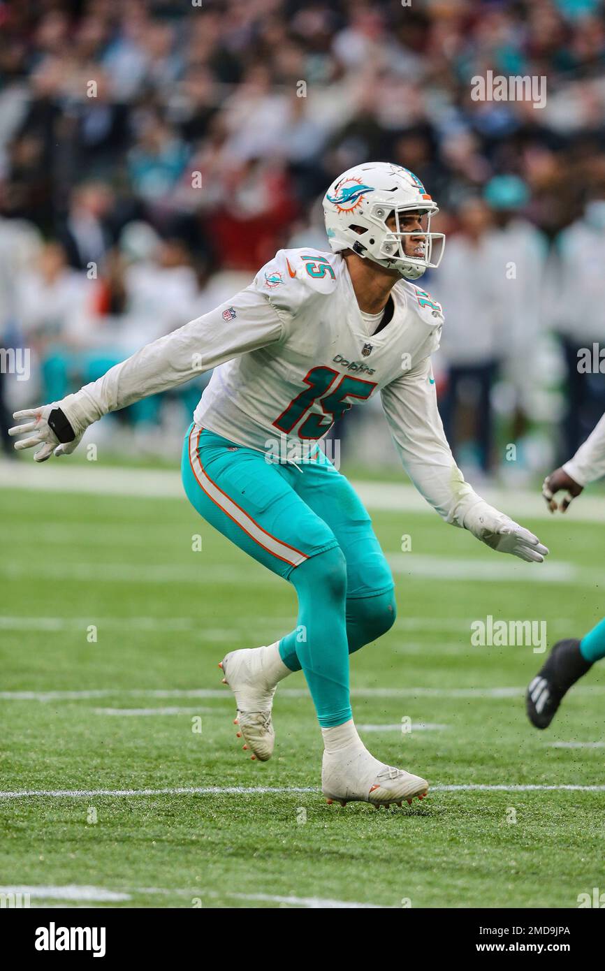 Miami Dolphins linebacker Jaelan Phillips (15) runs to the ball during the  second half of an NFL football game against the Jacksonville Jaguars at Tottenham  Hotspur Stadium in London, Sunday, Oct. 17