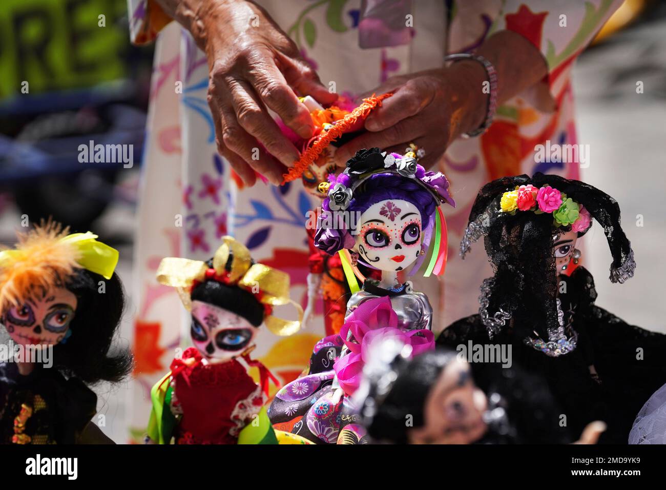 Mrs. Irma Vázquez, 77, manufactures and sells handmade Catrina dolls