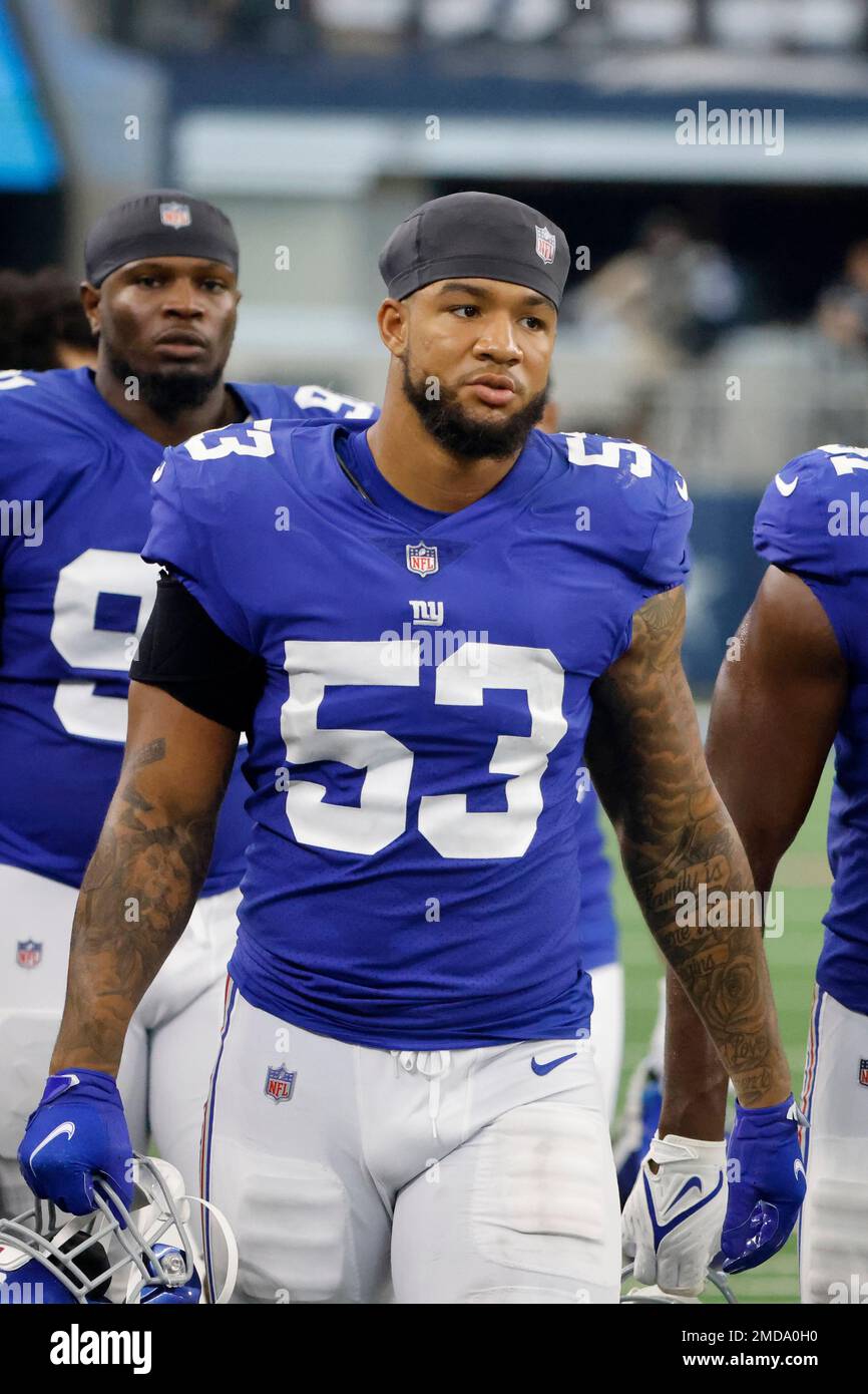 New York Giants linebacker Oshane Ximines (53) walks off the field as the  played the Dallas Cowboys during an NFL football game in Arlington, Texas,  Sunday, Oct. 10, 2021. (AP Photo/Michael Ainsworth