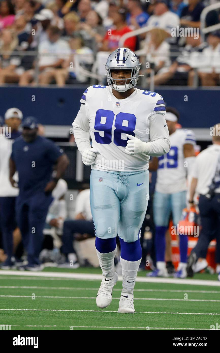 Dallas Cowboys defensive tackle Quinton Bohanna (98) jogs onto the field  against the New York Giants during an NFL football game in Arlington,  Texas, Sunday, Oct. 10, 2021. (AP Photo/Michael Ainsworth Stock