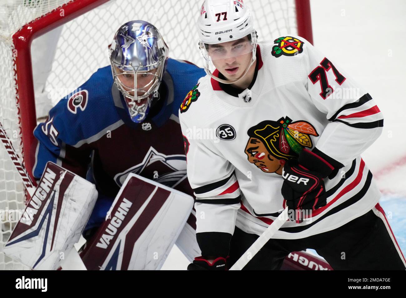 Chicago Blackhawks center Kirby Dach (77) and Colorado Avalanche