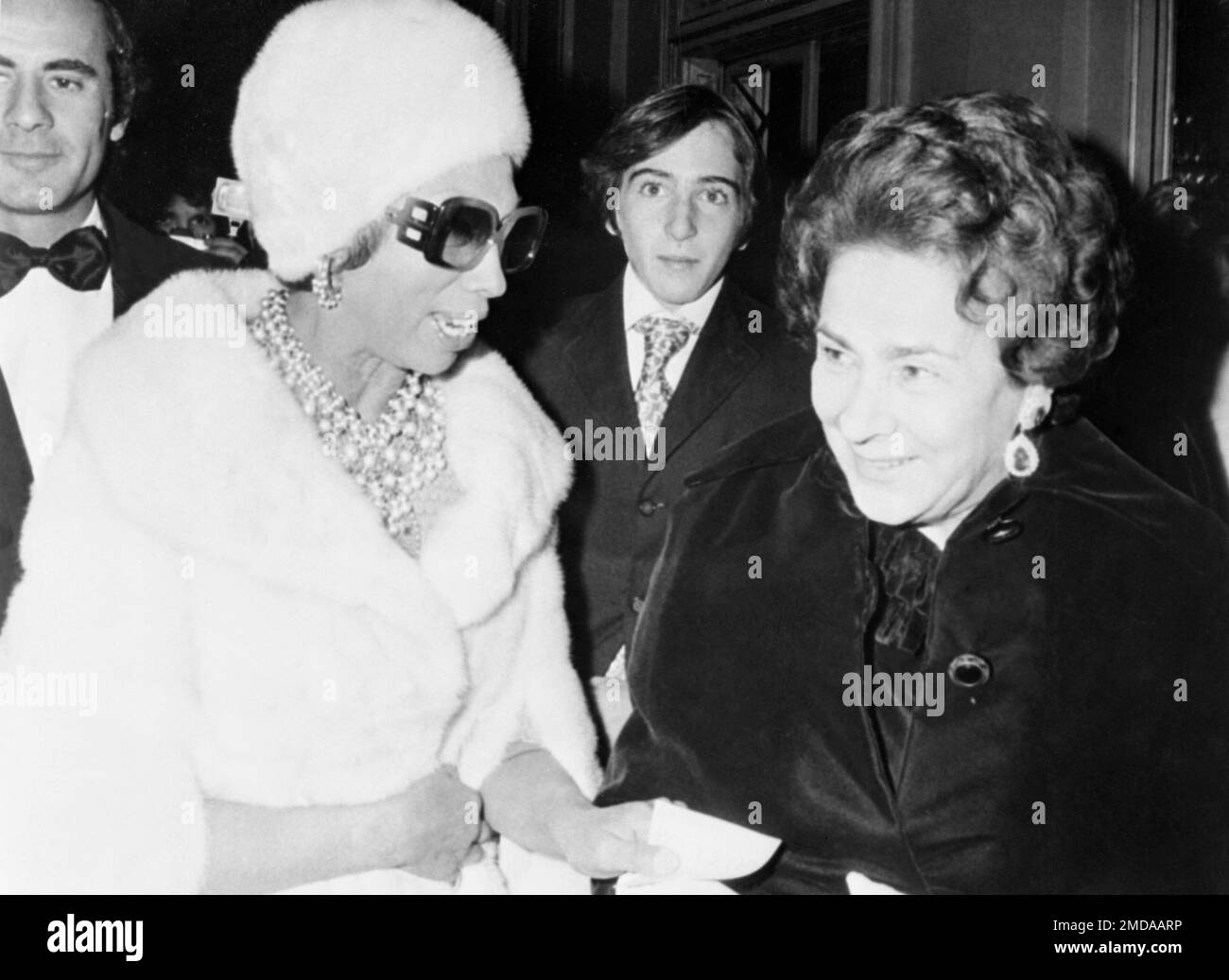 French singer Josephine Baker, left, talks to Wally Toscanini, daughter
