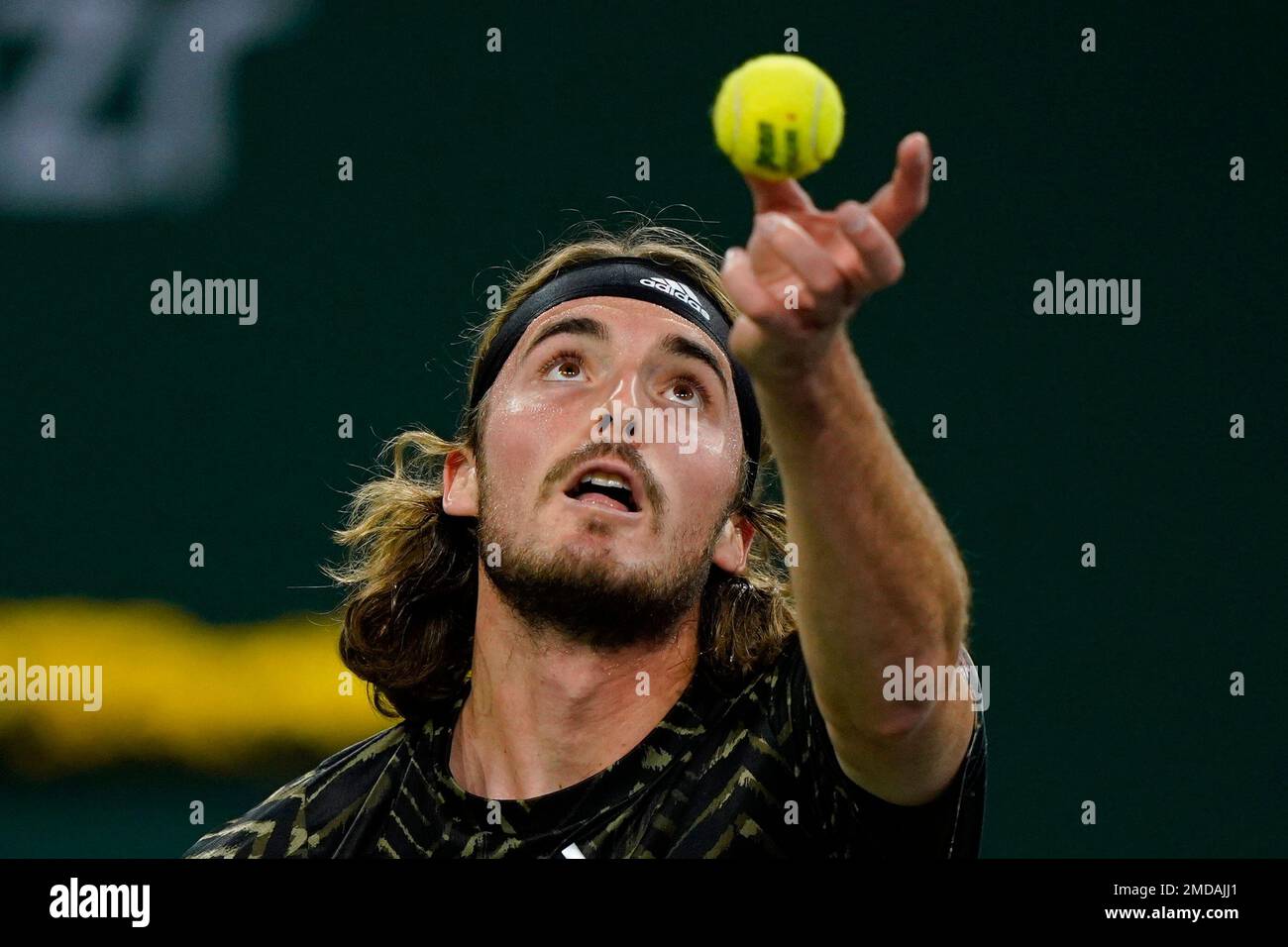 Stefanos Tsitsipas, of Greece, serves to Fabio Fognini, of Italy, at the  BNP Paribas Open tennis tournament Tuesday, Oct. 12, 2021, in Indian Wells,  Calif. (AP Photo/Mark J. Terrill Stock Photo - Alamy