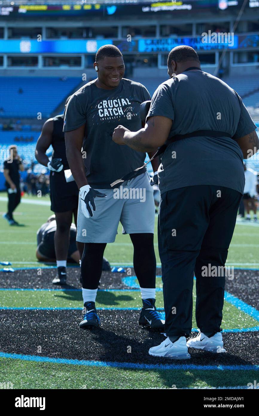 Carolina Panthers defensive tackle Derrick Brown (95) wears a Crucial Catch  t-shirt as he warms up prior to an NFL football game against the  Philadelphia Eagles, Sunday, Oct. 10, 2021, in Charlotte,