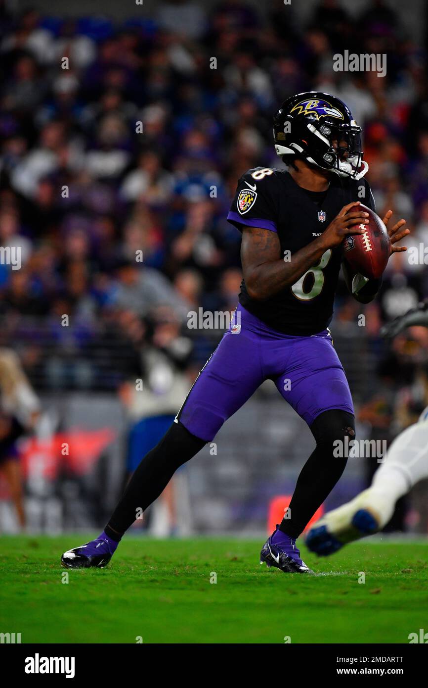 Baltimore Ravens quarterback Lamar Jackson looks to pass against