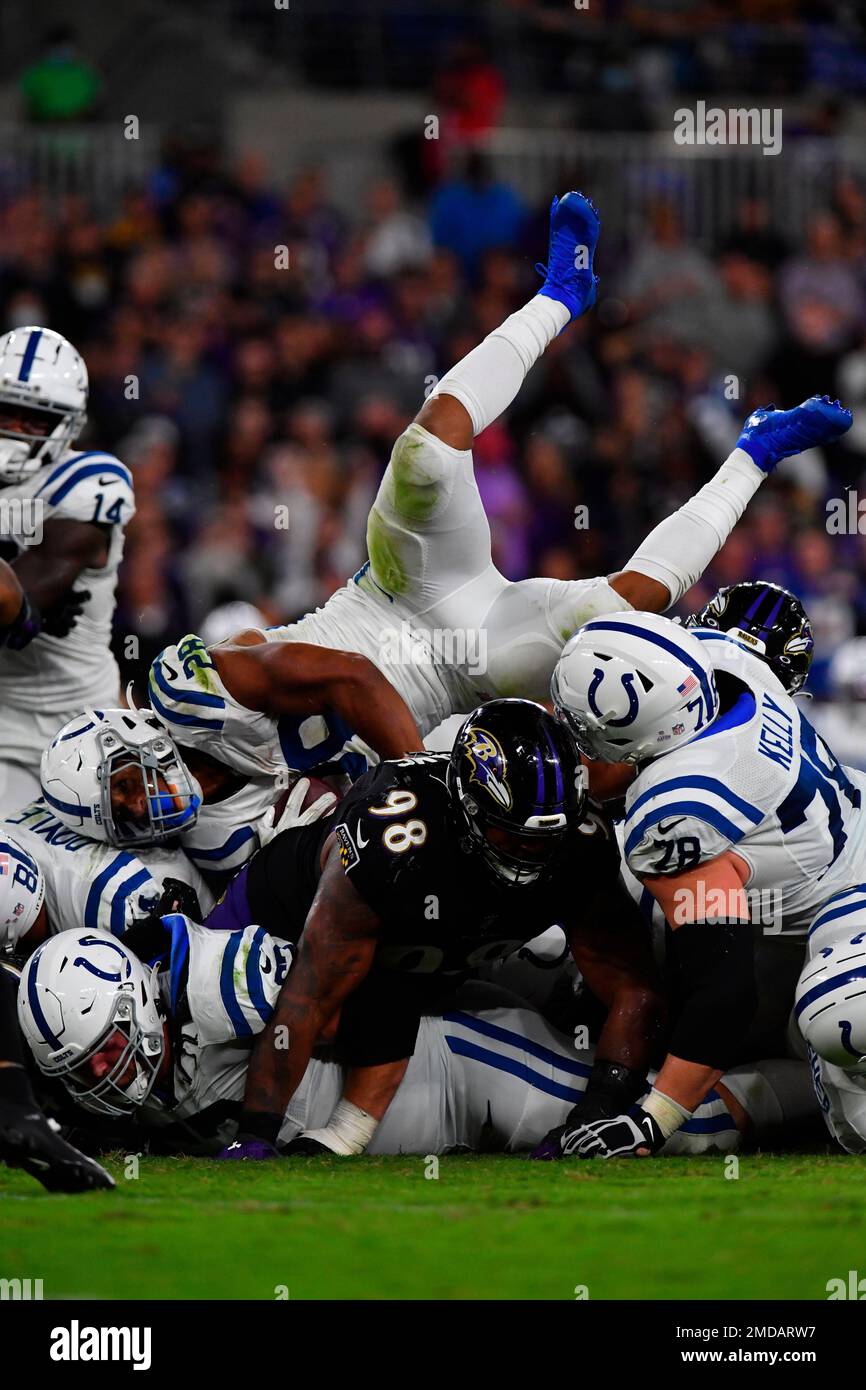 Indianapolis Colts running back Jonathan Taylor (28) goes airborne