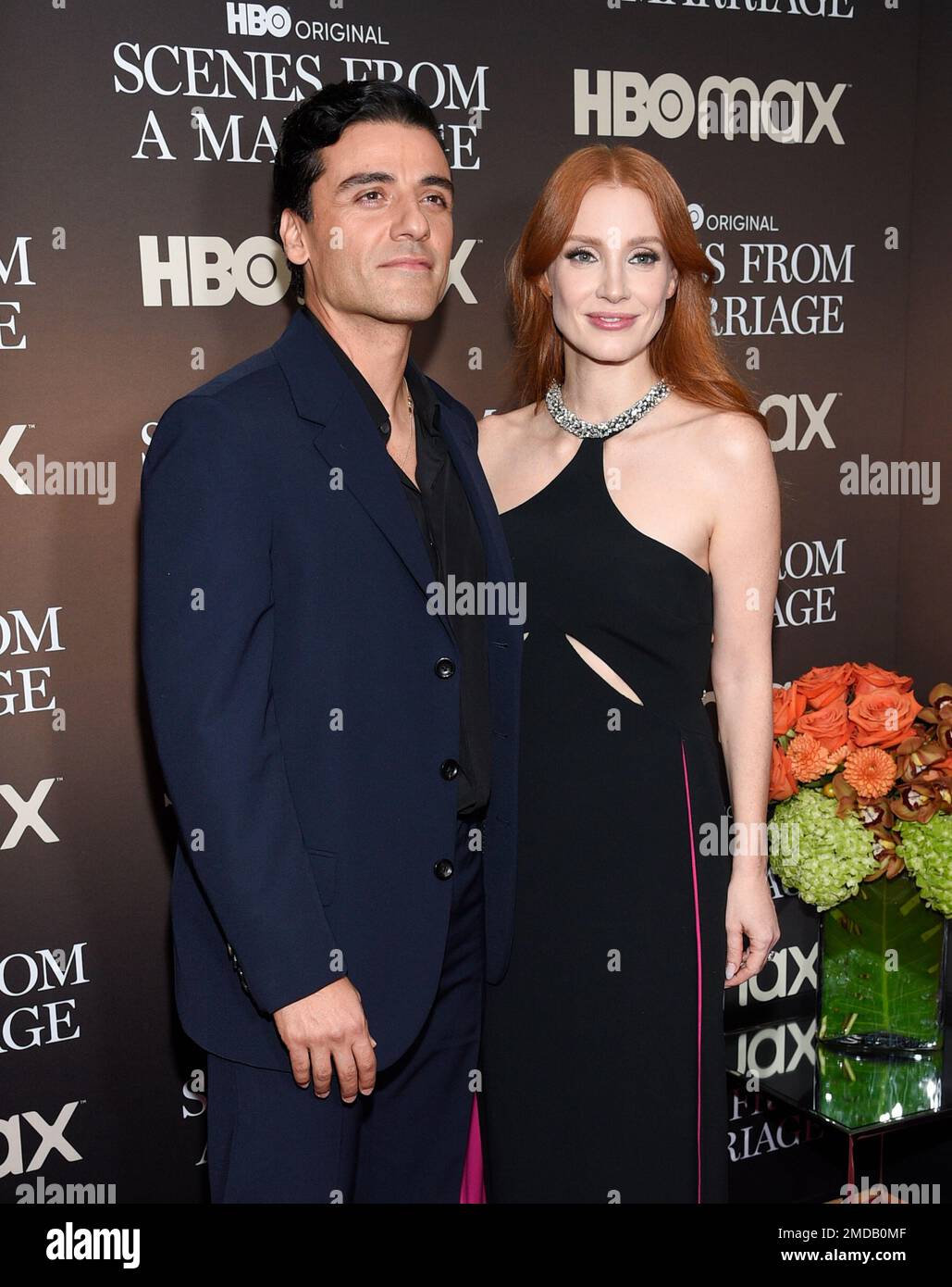 Actors Oscar Isaac, left, and Jessica Chastain pose together at a