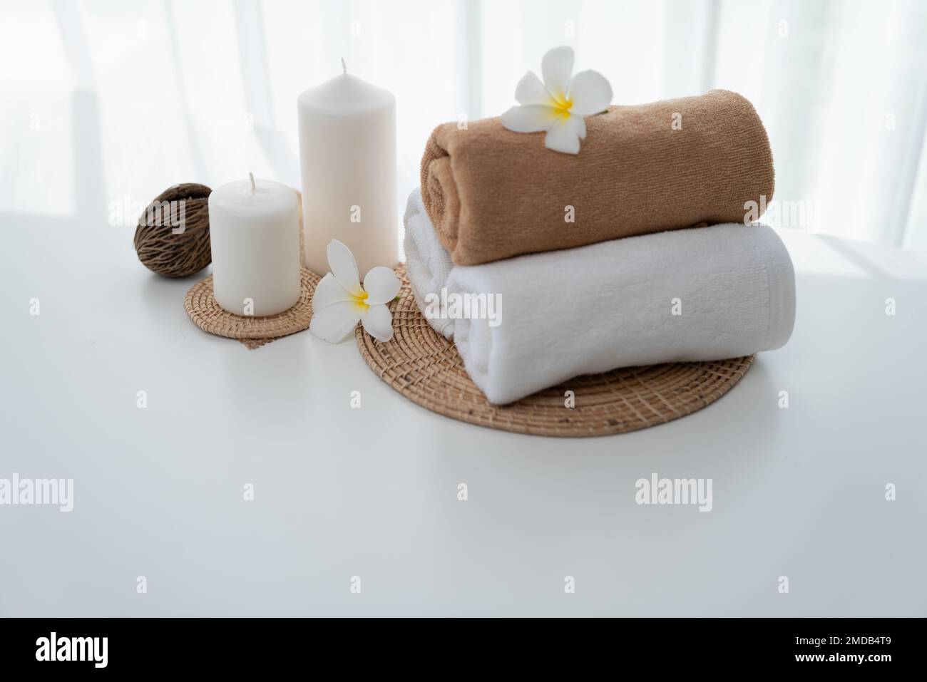 Spa accessory composition set in day spa hotel , beauty wellness center .  Spa product are placed in luxury spa resort room , ready for massage  therapy Stock Photo - Alamy