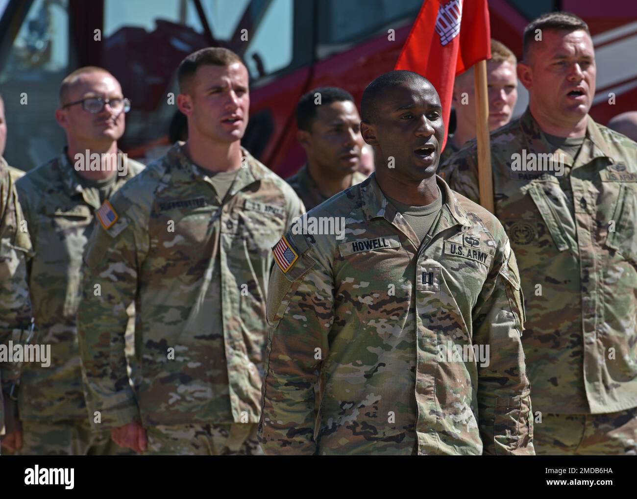 U.S. Army Capt. Jarred Howell, incoming Delta Company 169th Engineer Battalion commander, and members of the D CO 169th EN BN, sing the Army song during their change of command at Goodfellow Air Force Base, Texas, July 15, 2022. The U.S. Army has the largest joint presence on Goodfellow. Stock Photo