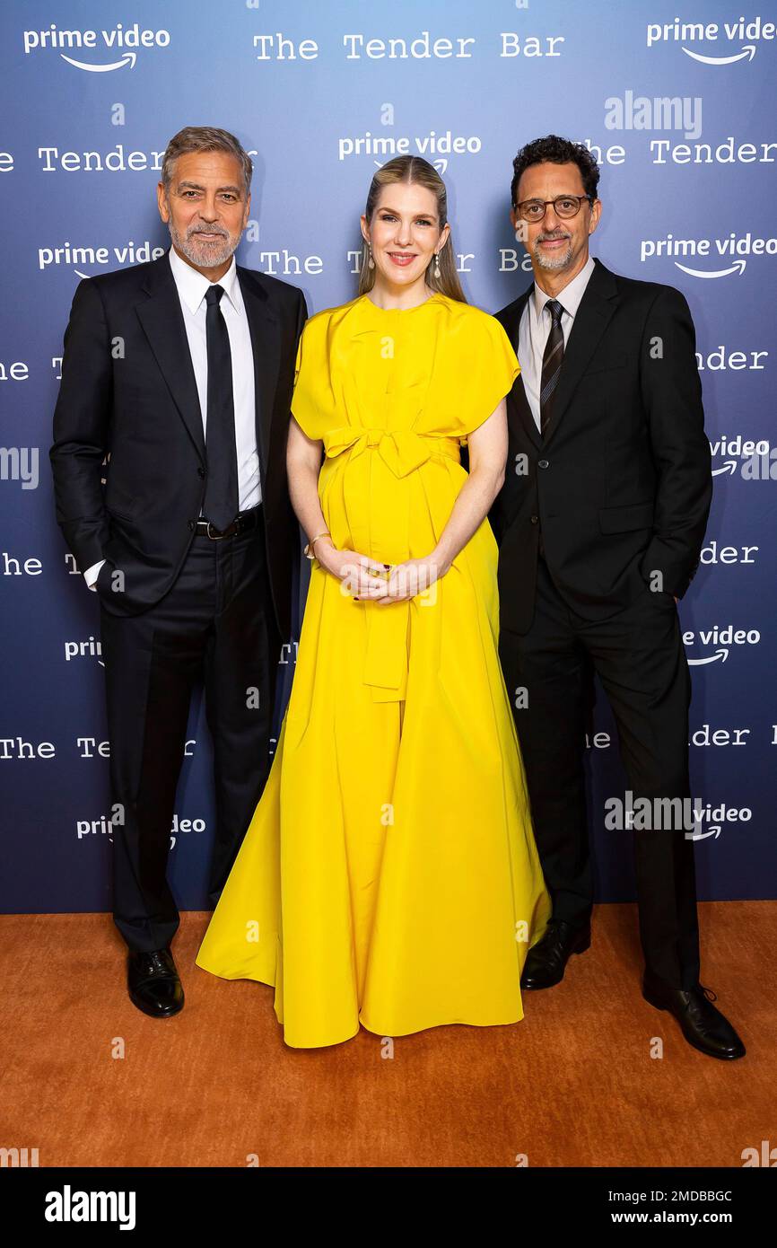 George Clooney, Lily Rabe and Grant Heslov pose for photographs at the ...