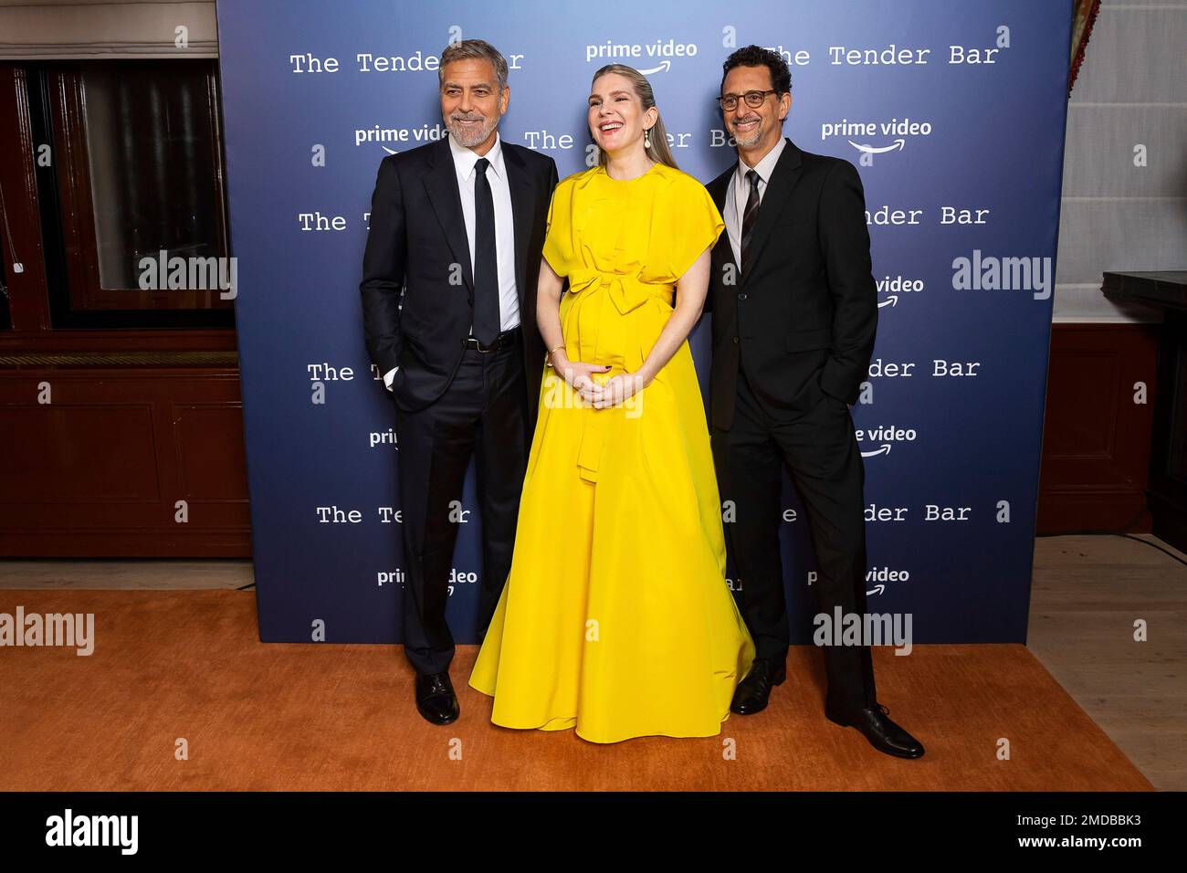 George Clooney, Lily Rabe and Grant Heslov pose for photographs at the ...