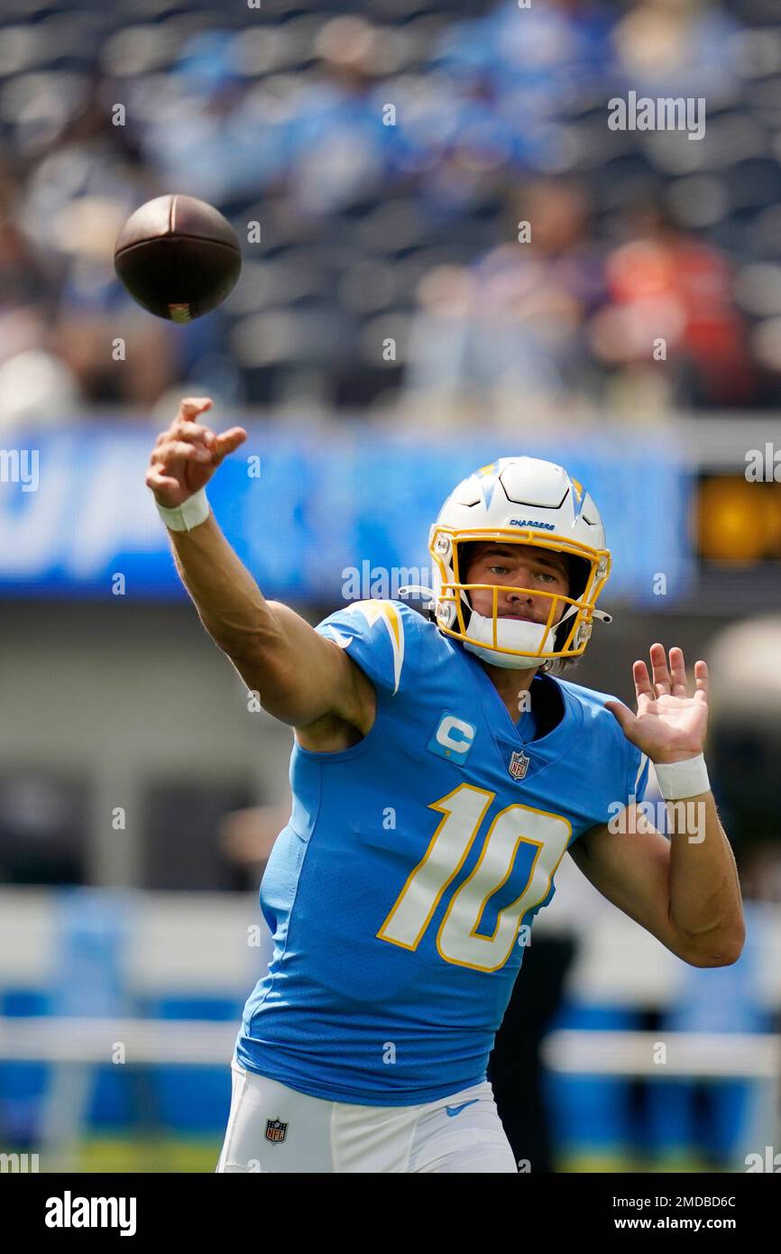 Los Angeles Chargers quarterback Justin Herbert warms up before an