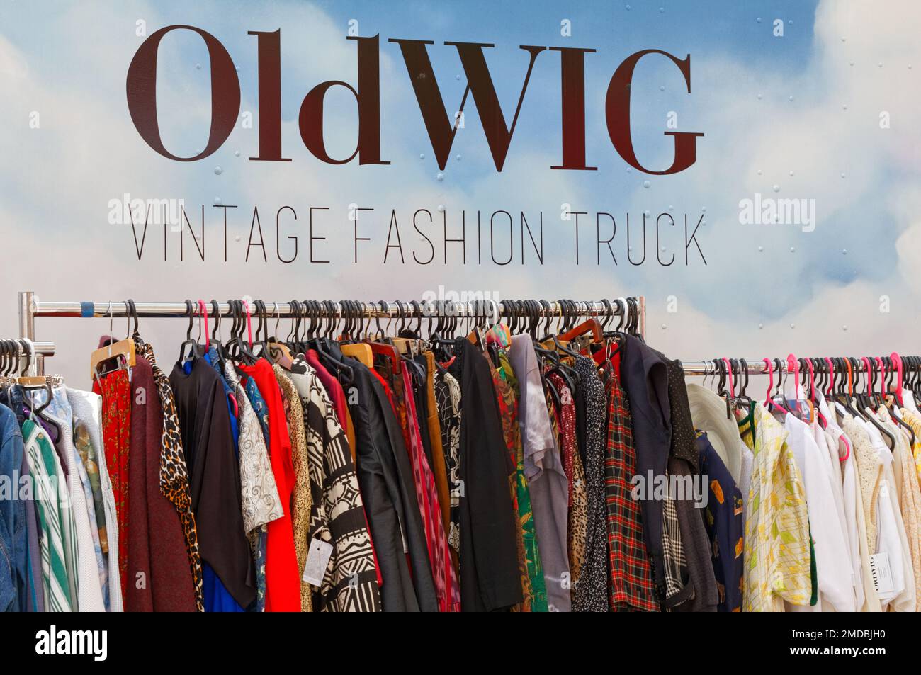 Old wig old clothing fashion truck with a rack of used clothing