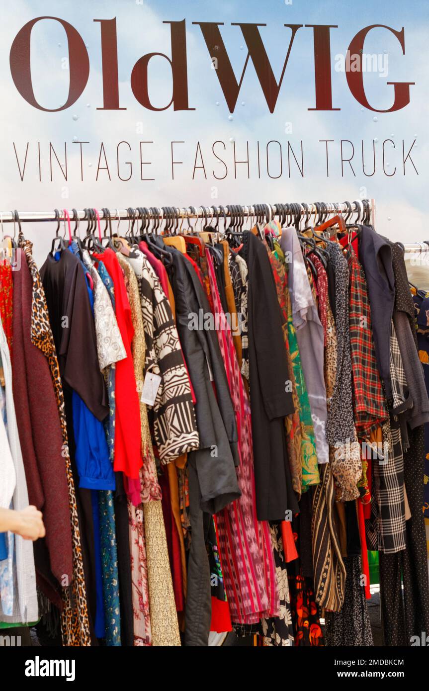 Old wig old clothing fashion truck with a rack of used woman's clothing