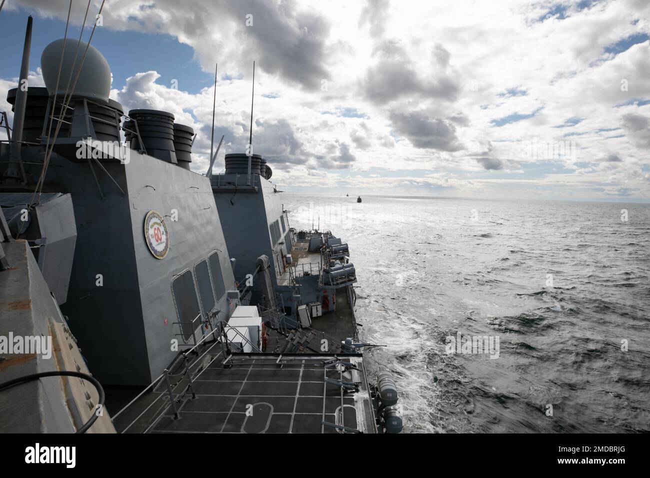 220715-N-DE439-1132 BALTIC SEA (July 15, 2022) The Arleigh Burke-class guided-missile destroyer USS Arleigh Burke (DDG 51) gets in formation during a ship maneuvering exercise with the Finnish Navy Hamina-class missile boat FNS Hamina (80) and the Swedish Navy ship HMS Kullen (M74), July 15, 2022. Arleigh Burke is on a scheduled deployment in the U.S. Naval Forces Europe area of operations, employed by U.S. Sixth Fleet to defend U.S., allied and partner interests. Stock Photo