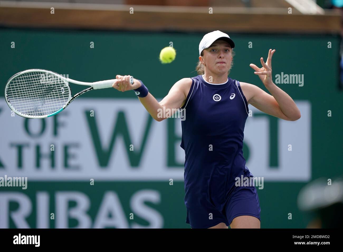 Iga Swiatek, of Poland, in action against Petra Martic, of Croatia, at the  BNP Paribas Open tennis tournament Friday, Oct. 8, 2021, in Indian Wells,  Calif. (AP Photo/Mark J. Terrill Stock Photo -