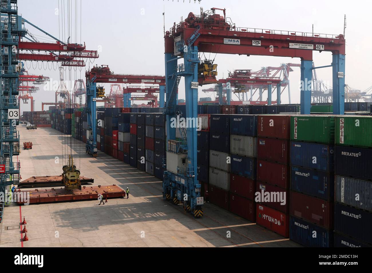 Containers are stacked at the terminal of Indonesia Port Corporations ...