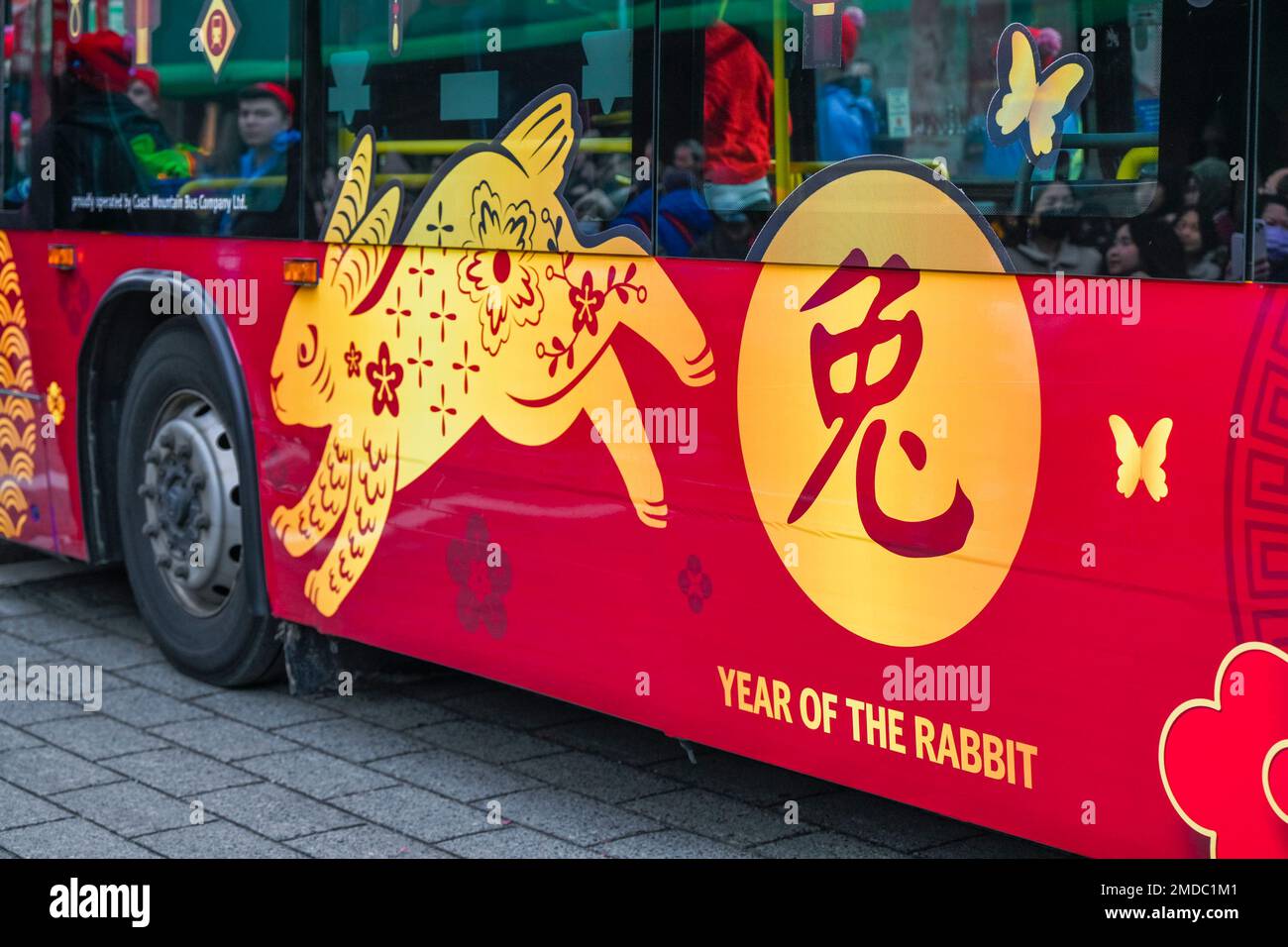 Year of the Rabbit bus, Chinese Lunar New Year Parade, Chinatown, Vancouver, British Columbia, Canada Stock Photo