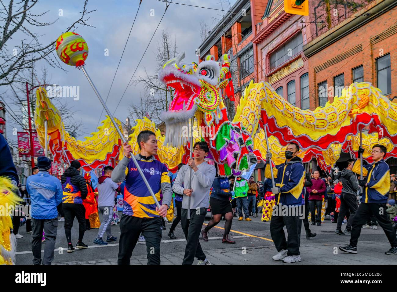 Dragon dance team, Chinese Lunar New Year Parade, Chinatown, Vancouver, British Columbia, Canada Stock Photo