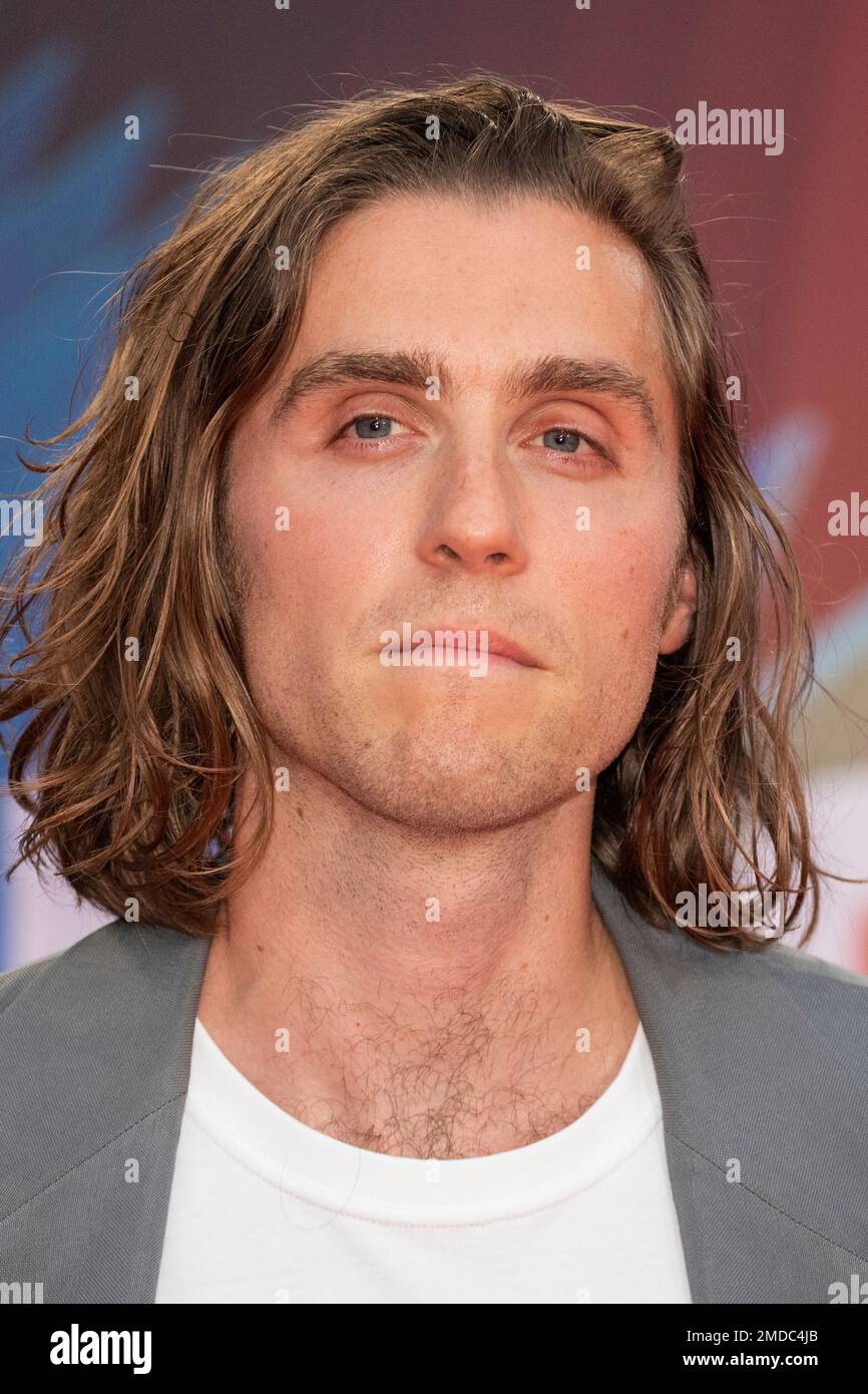 Jack Farthing poses for photographers upon arrival at the premiere of