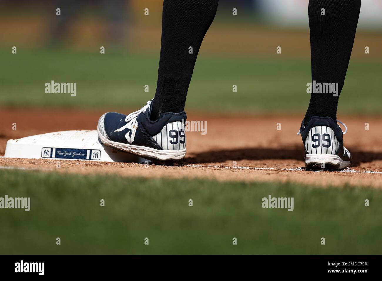 New York Yankees designated hitter Aaron Judge wears custom cleats in the  dugout before a baseball game against the Seattle Mariners, Wednesday, May  31, 2023, in Seattle. (AP Photo/Lindsey Wasson Stock Photo 