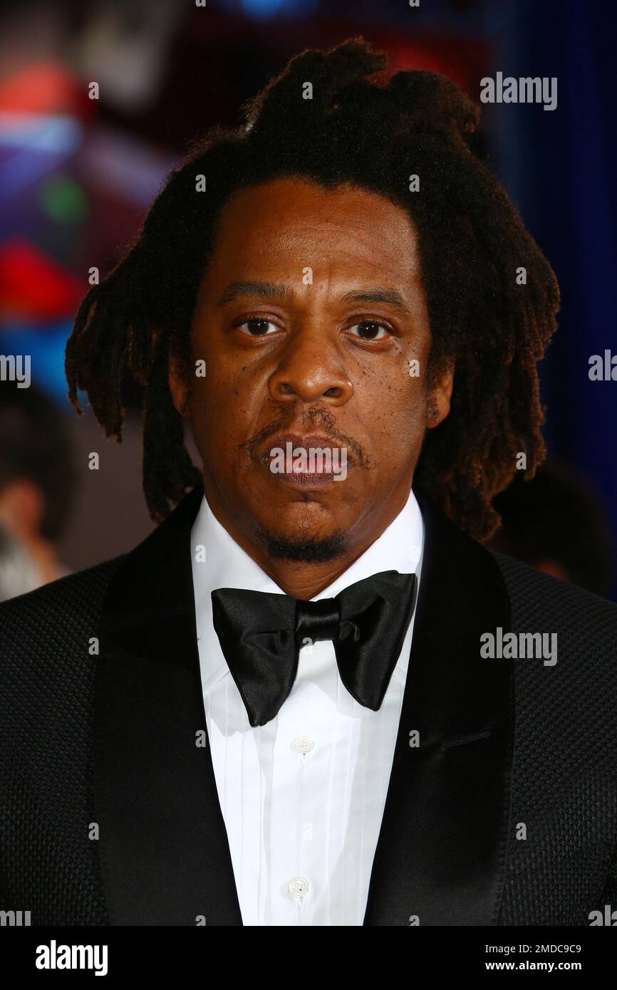 Shawn Carter, known as Jay Z , poses for photographers upon arrival at