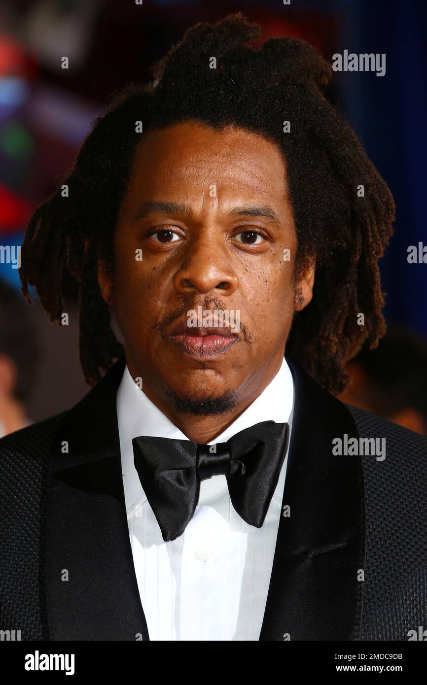 Shawn Carter, known as Jay Z , poses for photographers upon arrival at