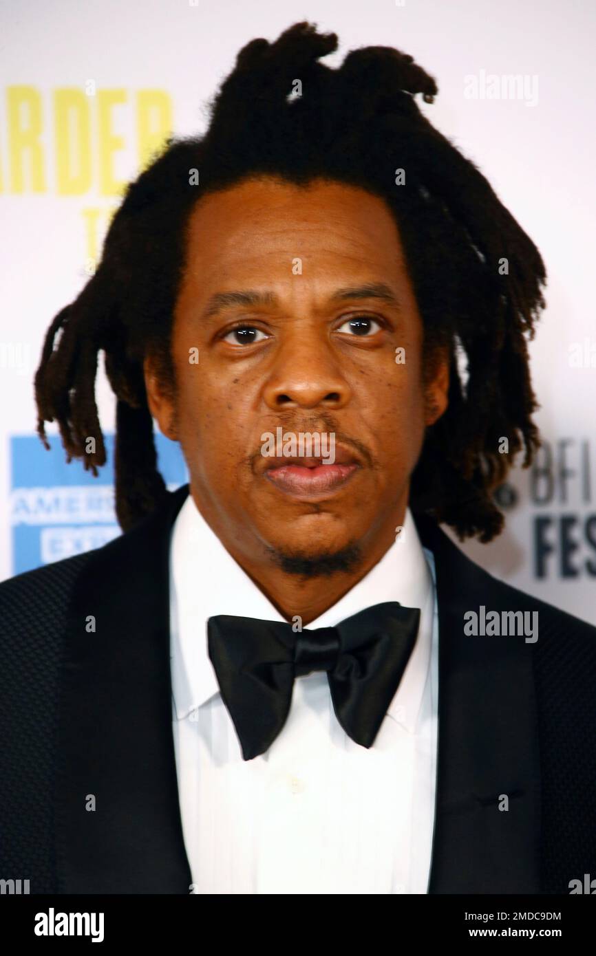 Shawn Carter, known as Jay Z , poses for photographers upon arrival at
